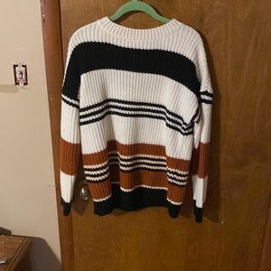 Black whit and brown sweater